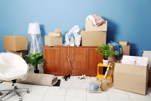 Packed moving boxes ready for collection or transport in Abbeywood
