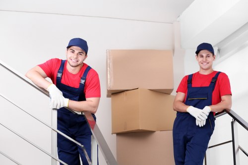 Packed office furniture and equipment ready for a business move