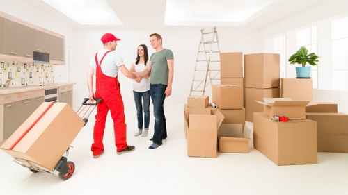 Furniture and boxes being transported by a local Abbeywood moving team
